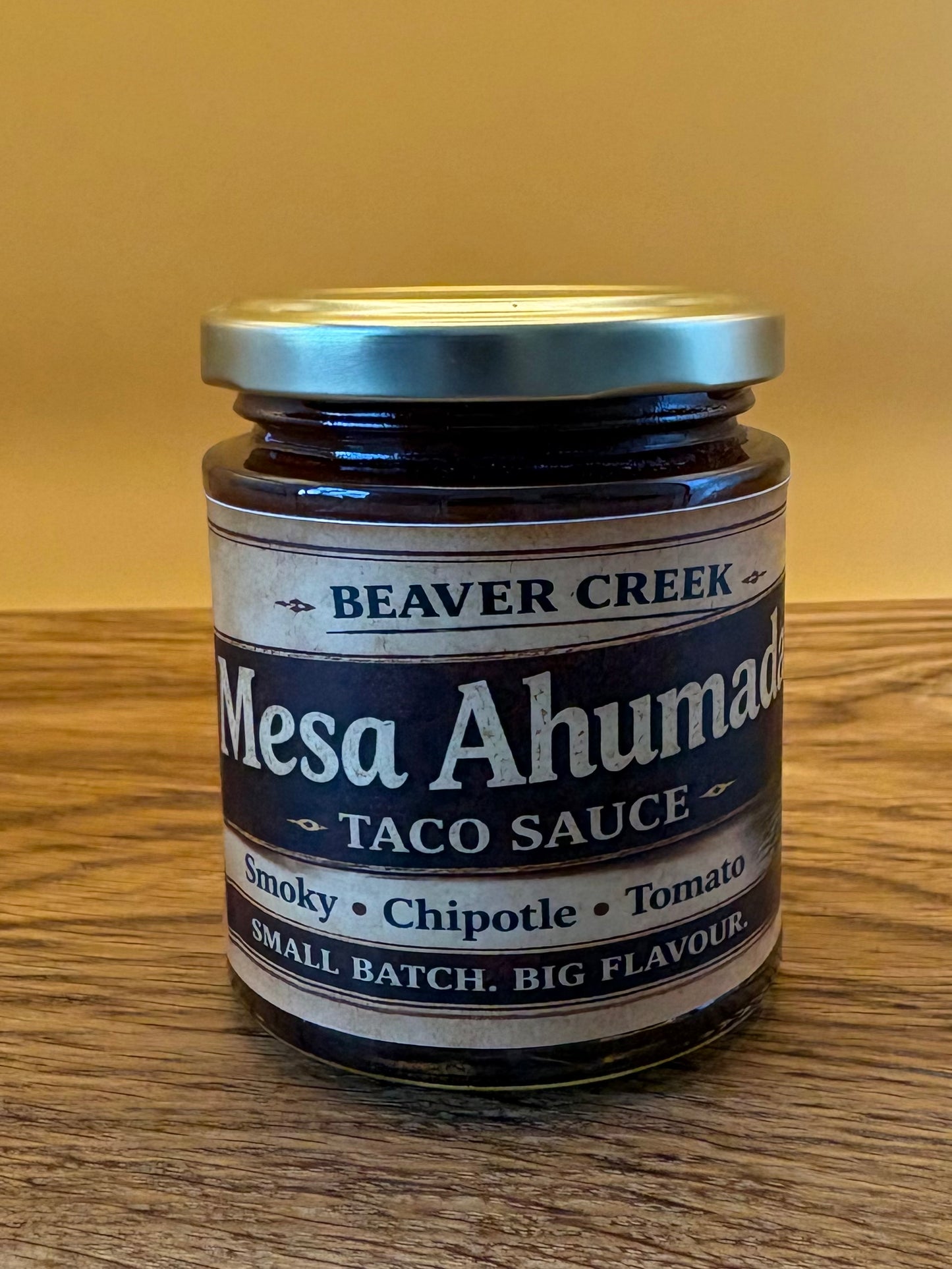 Bottle of Mesa Ahumada smoky chipotle taco sauce by Beaver Creek BBQ
