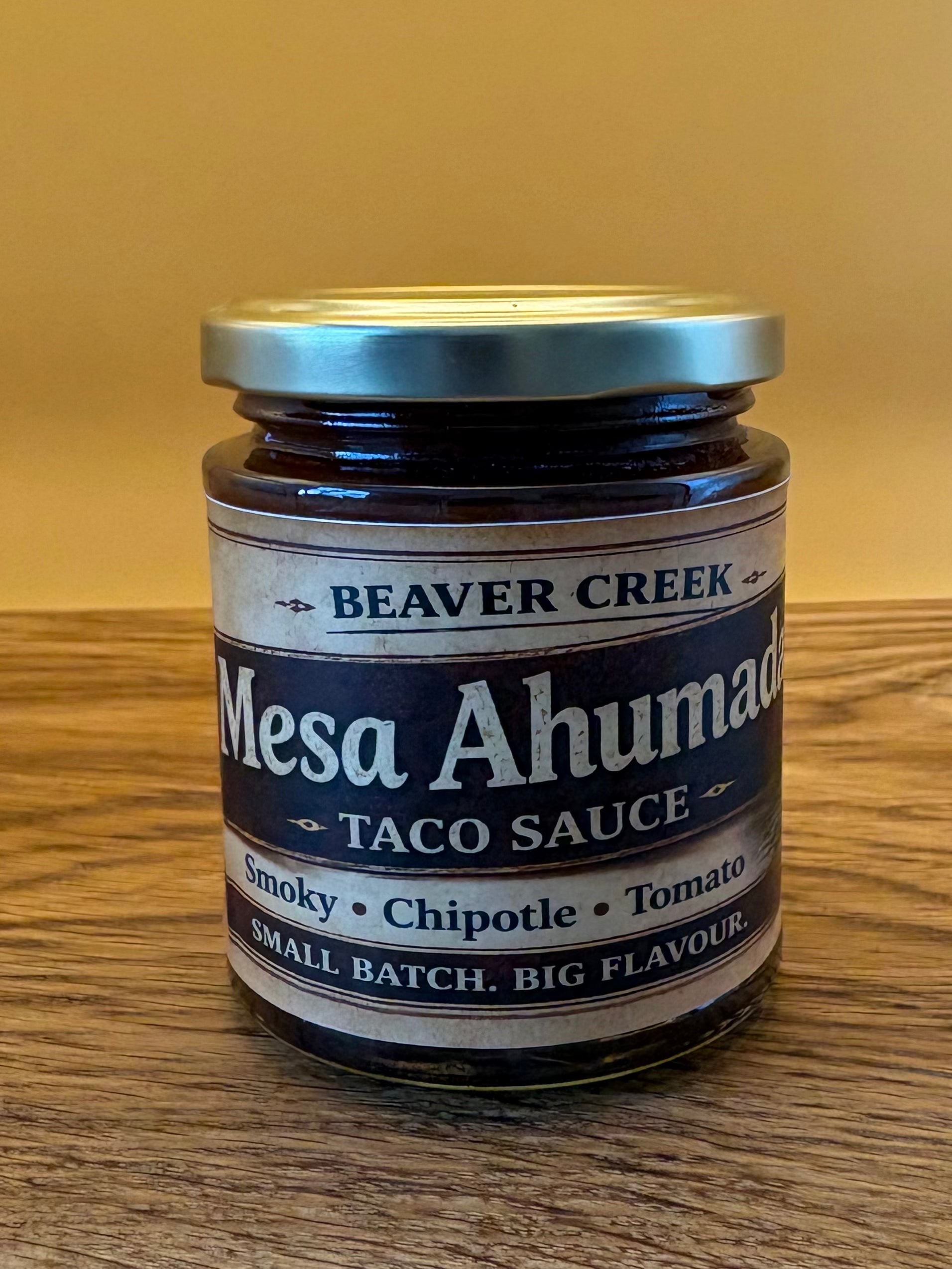 Bottle of Mesa Ahumada smoky chipotle taco sauce by Beaver Creek BBQ